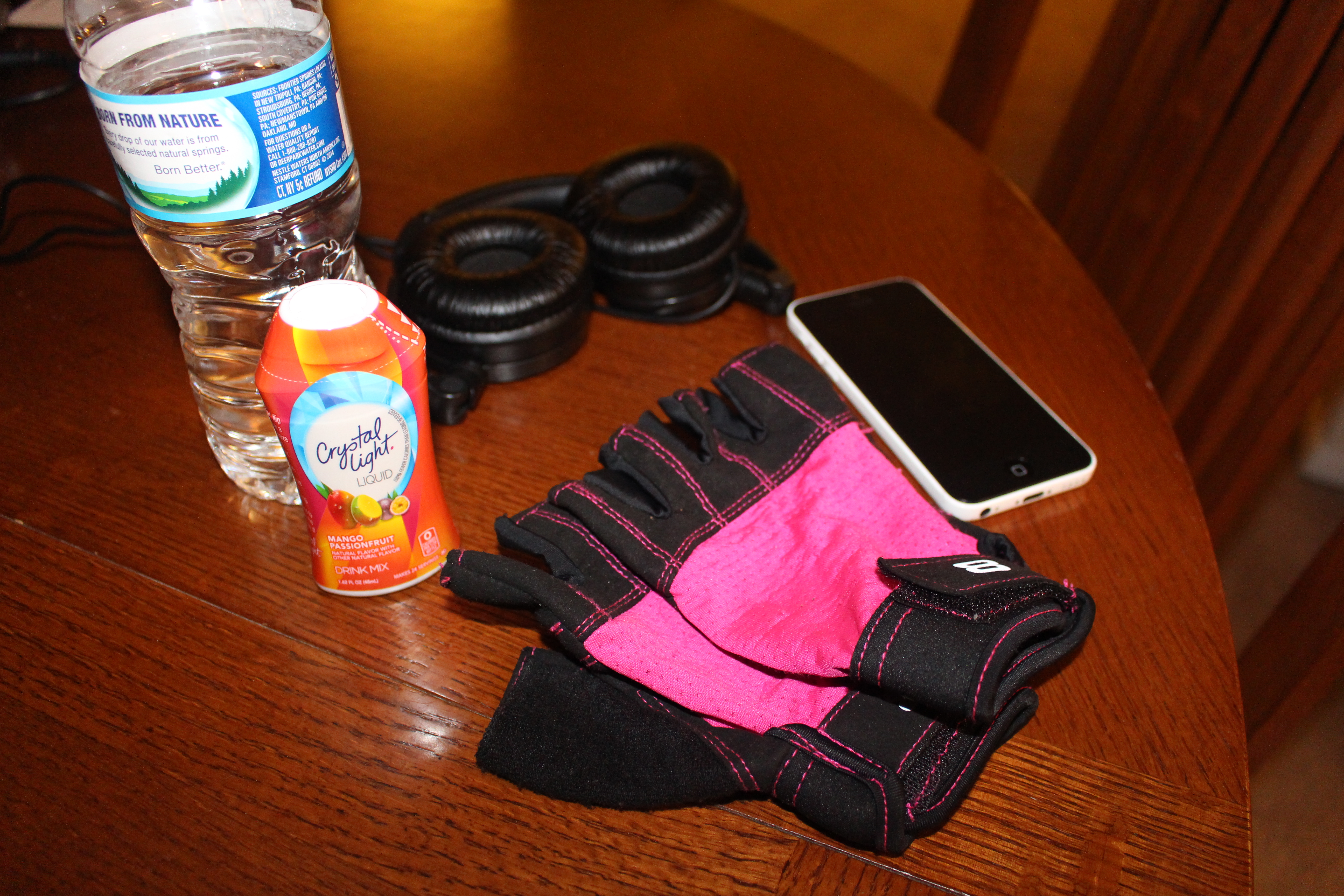 Crystal Light Low Calorie Drinks in Walmart Stores, gym essentials like headphones, iPhone and weight gloves
