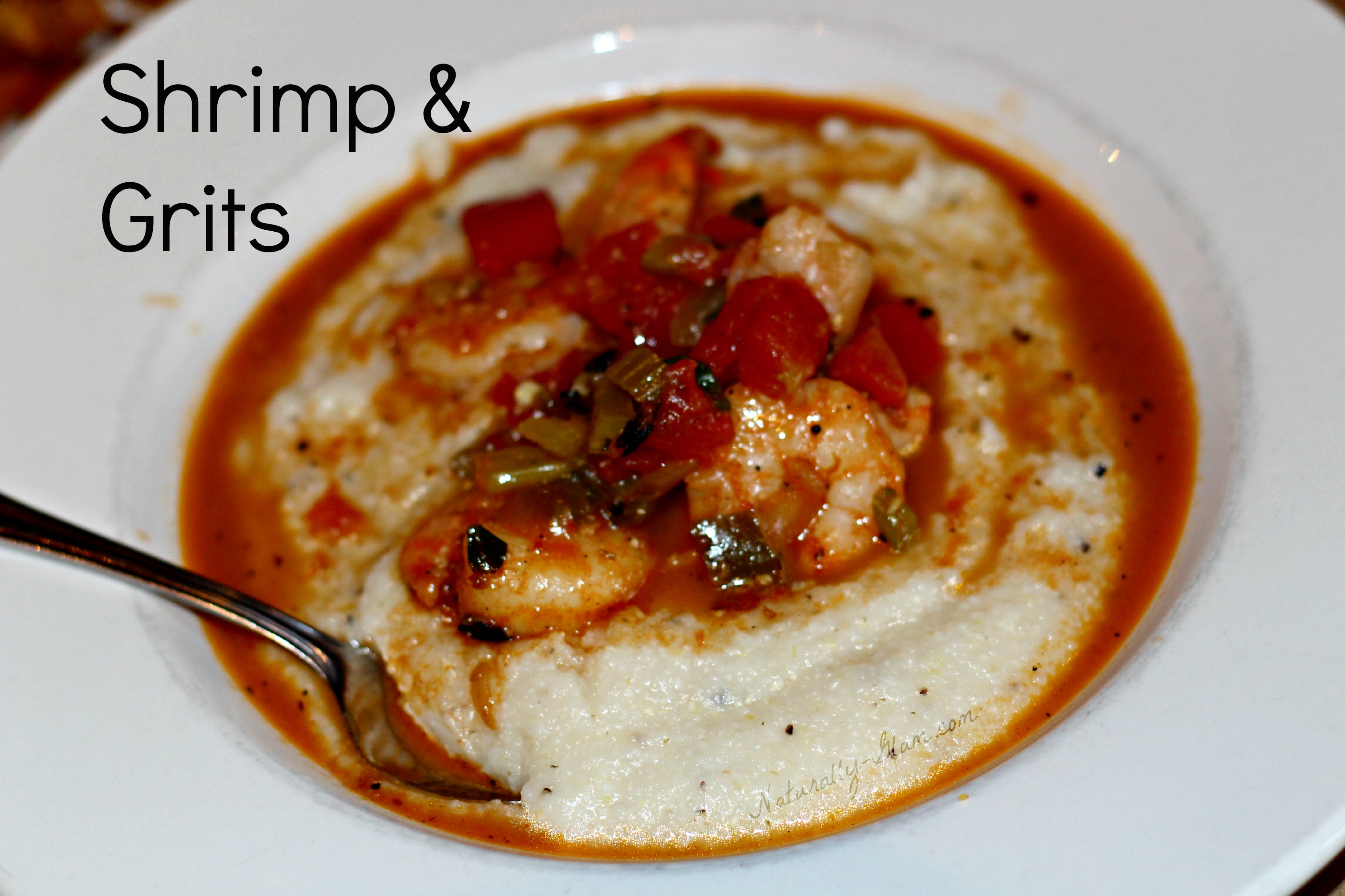 Shrimp and Grits plated with spoon