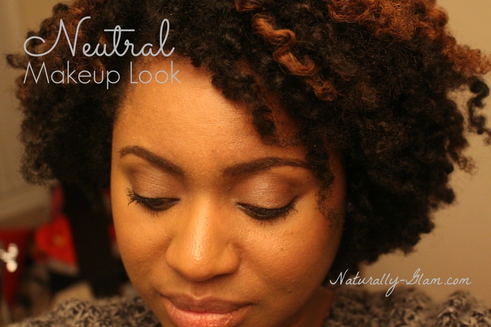 neutral makeup look on black woman with natural hair
