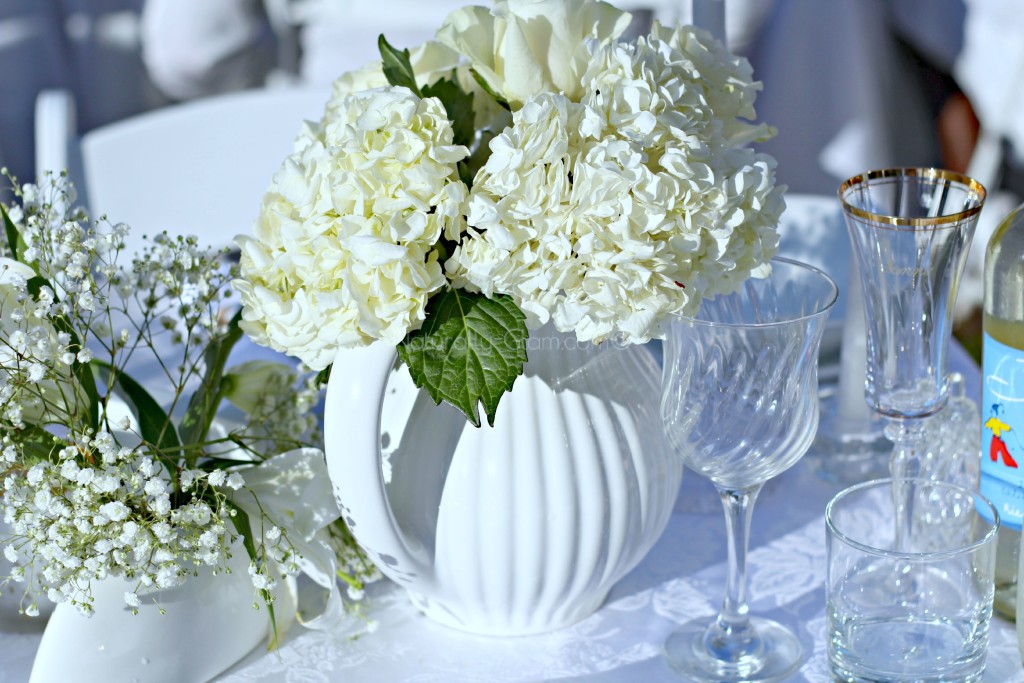 floral centerpieces, asiac lily, baby's breath, hydrangea, white roses