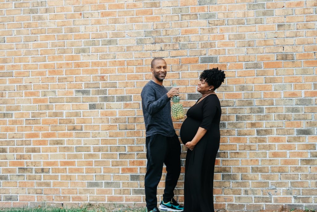 Black couple, husband and pregnant wife, third trimester, pregnancy, the bump