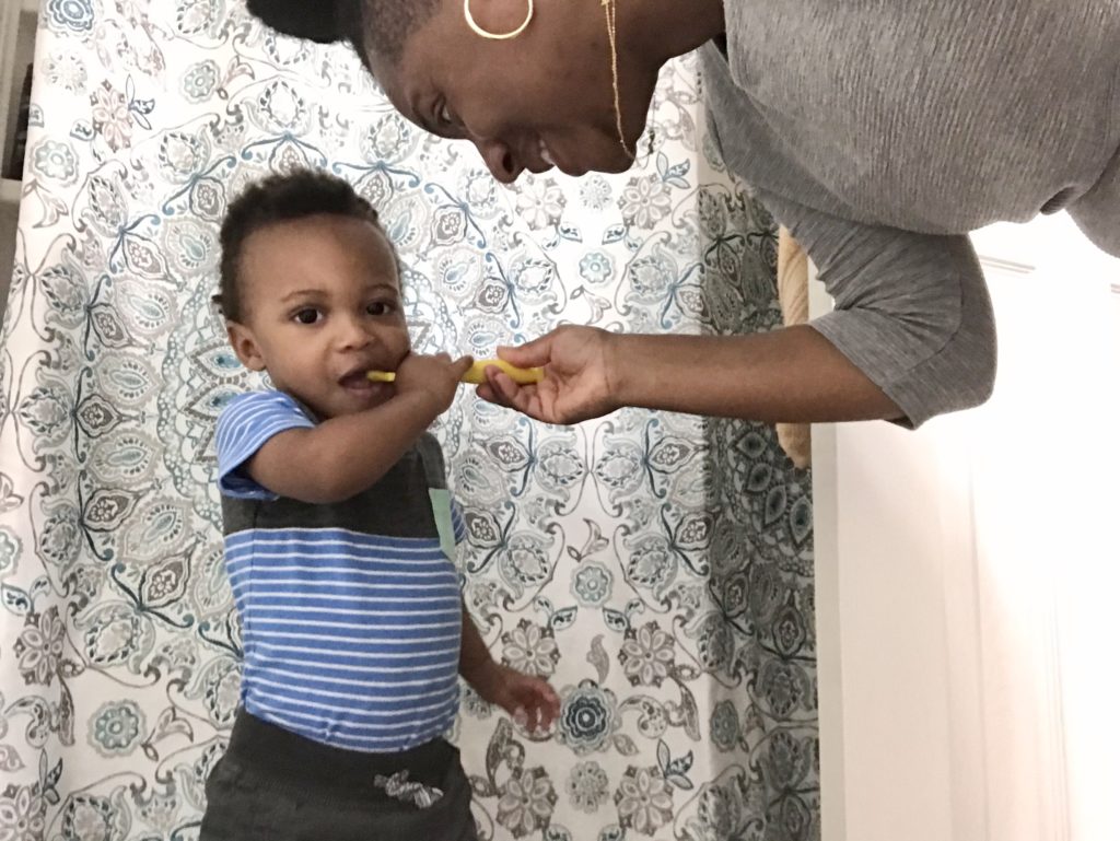 morning routine, toddler brushing his teeth