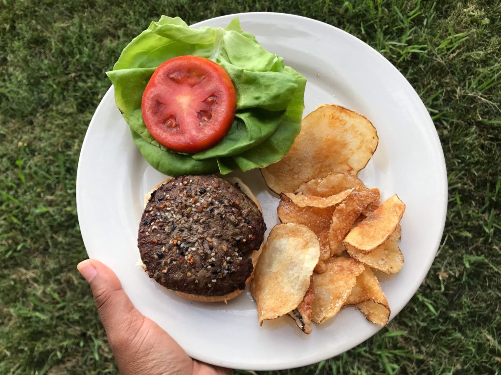 neighborhood harvest, Suffolk, virginia, local produce, grass-fed beef burgers in air fryer with tomato, lettuce, and chips on side