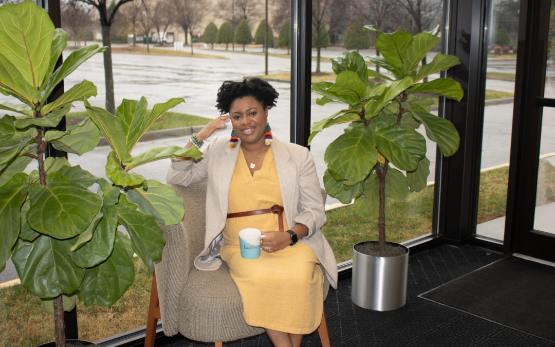 black woman in career environment, tuition assistance for Virginia college students